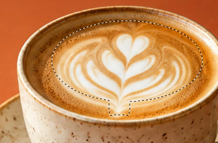 L’ovale tratteggiato e la breve estensione sul gambo ripristinati sopra la tazza di caffè