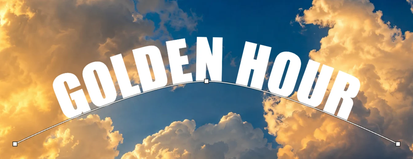 Le lettere bianche GOLDEN HOUR poggiate sulla linea ad arco sopra le nuvole